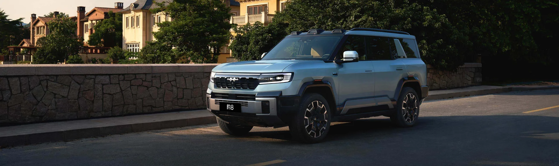 Fangchengbao Bao 8 hybrid SUV on a residential road